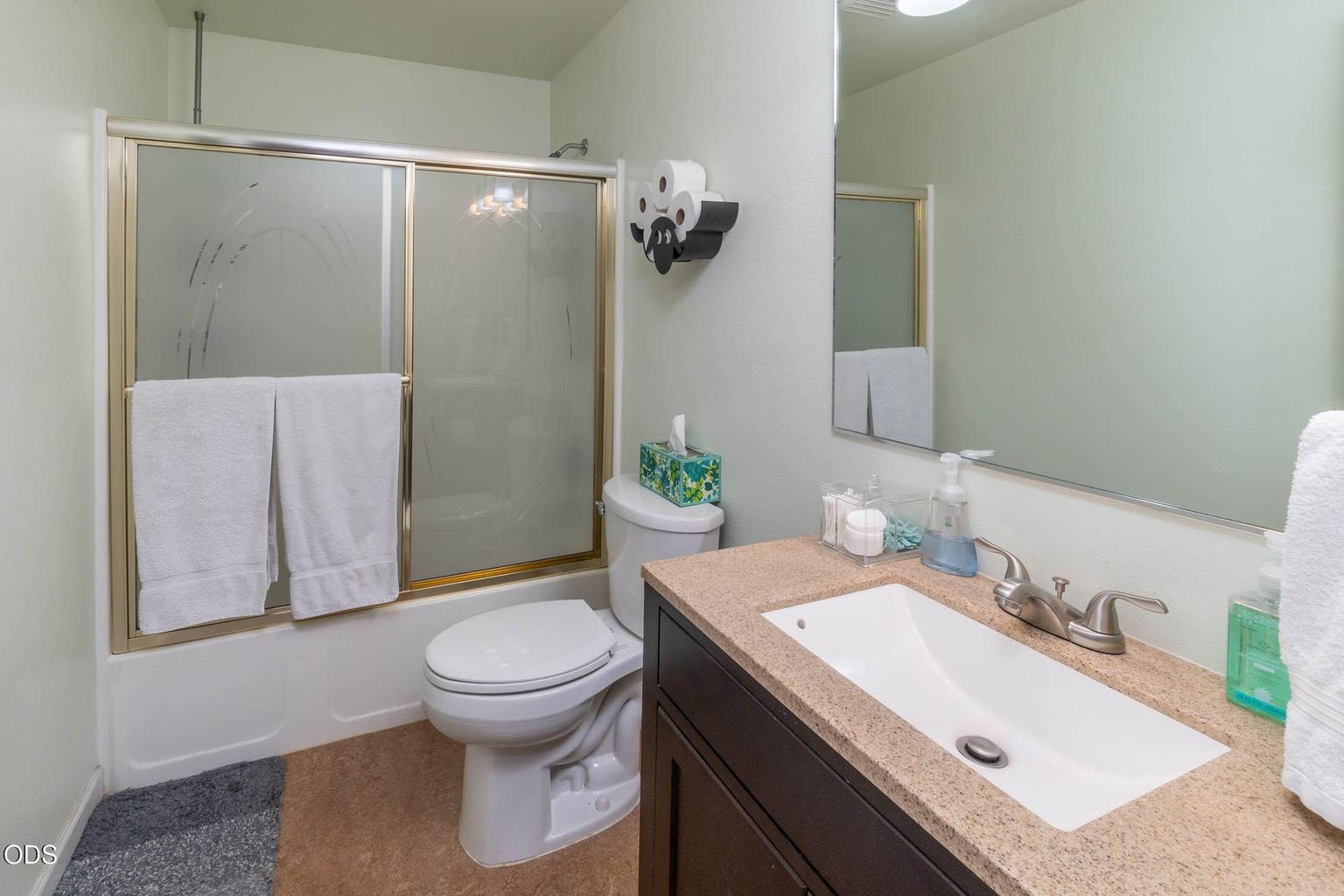 Bedrooms 2 and 3 share the main bath including the full tub-shower with doors.