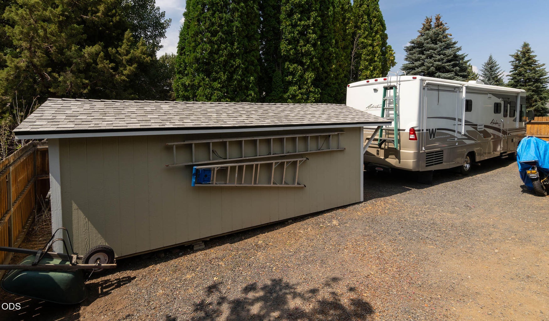 The shed is right behind the RV spot, measuring at 10 x 20' it has been insulated, sheetrocked, includes 2 windows, and has power. This has proved to be the perfect hobby spot, storage for seasonal items, and tool shed. This shed is painted and roofed to match the home. ** Note: rare large RV Pkg Spot in front of shed for motorhome, + another spot of 10x25' to park your boat or tow-car. Very spacious and out-of-site!