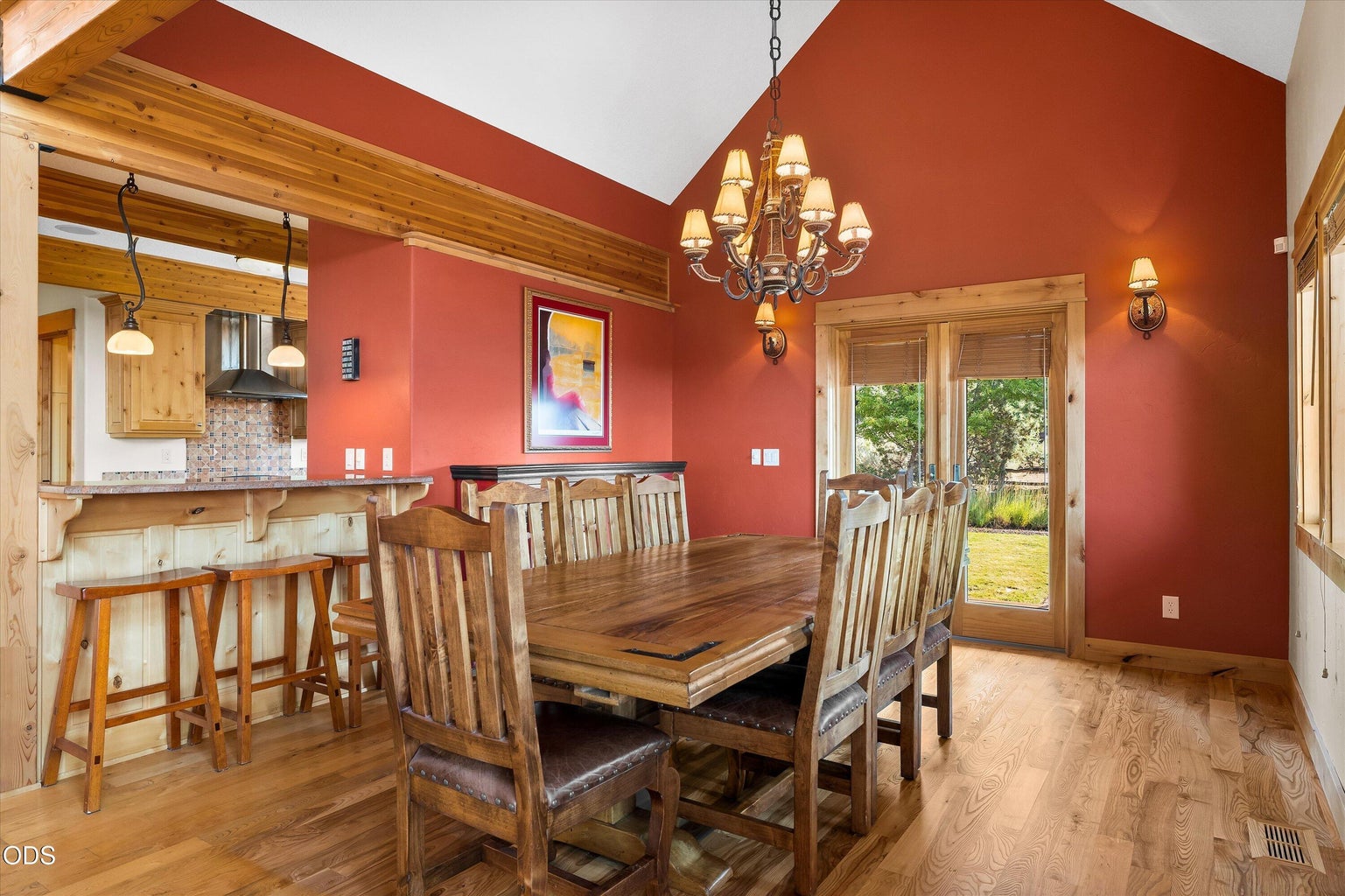 Large dining room seats many guests and room for storage furniture