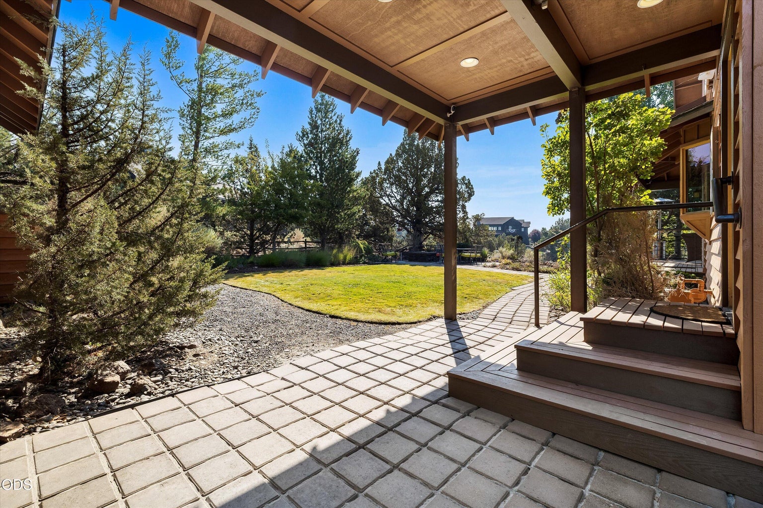 Covered walkway connects the house to the garage