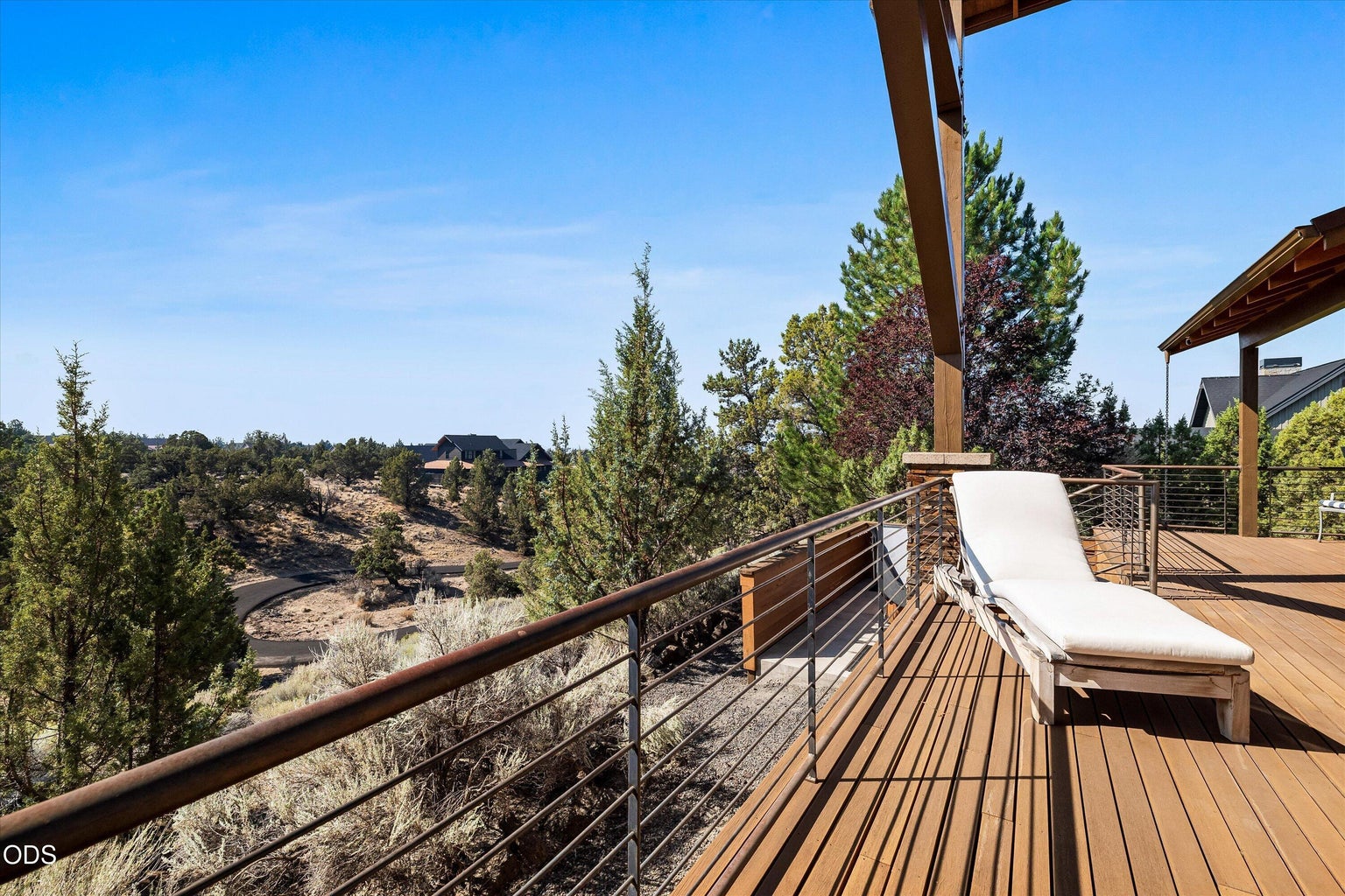 Sunbathe, gather, eat, play on this expansive deck