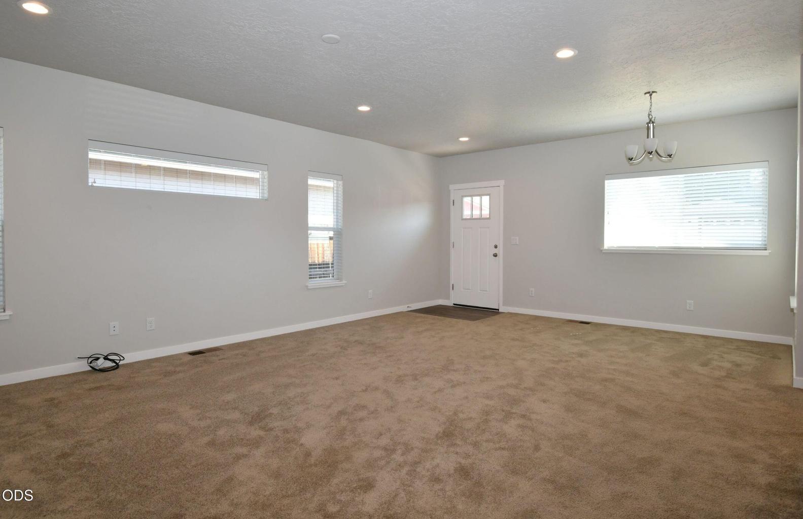 Living room, dining area & front door