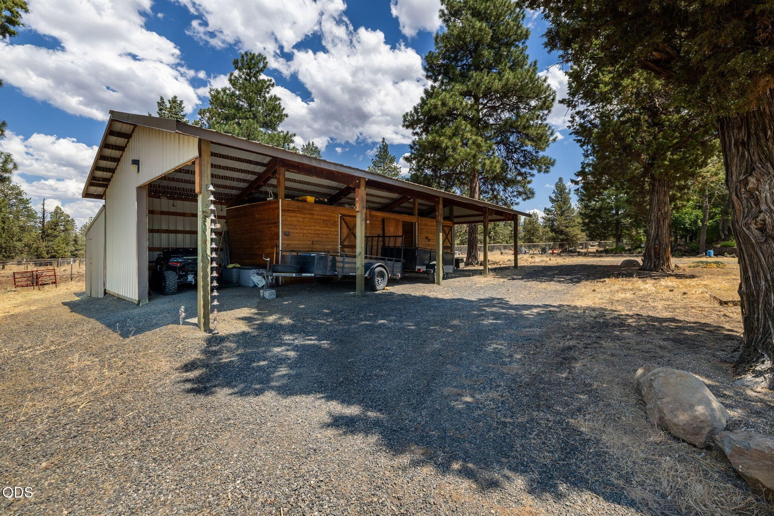 Covered parking area for your toys. RV parking with electric and water