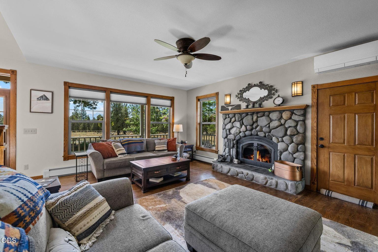 River Rock fireplace with wood storage area