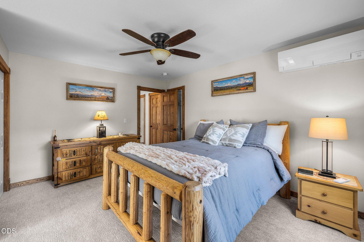 Upper level bedroom with double closets, storage room and views
