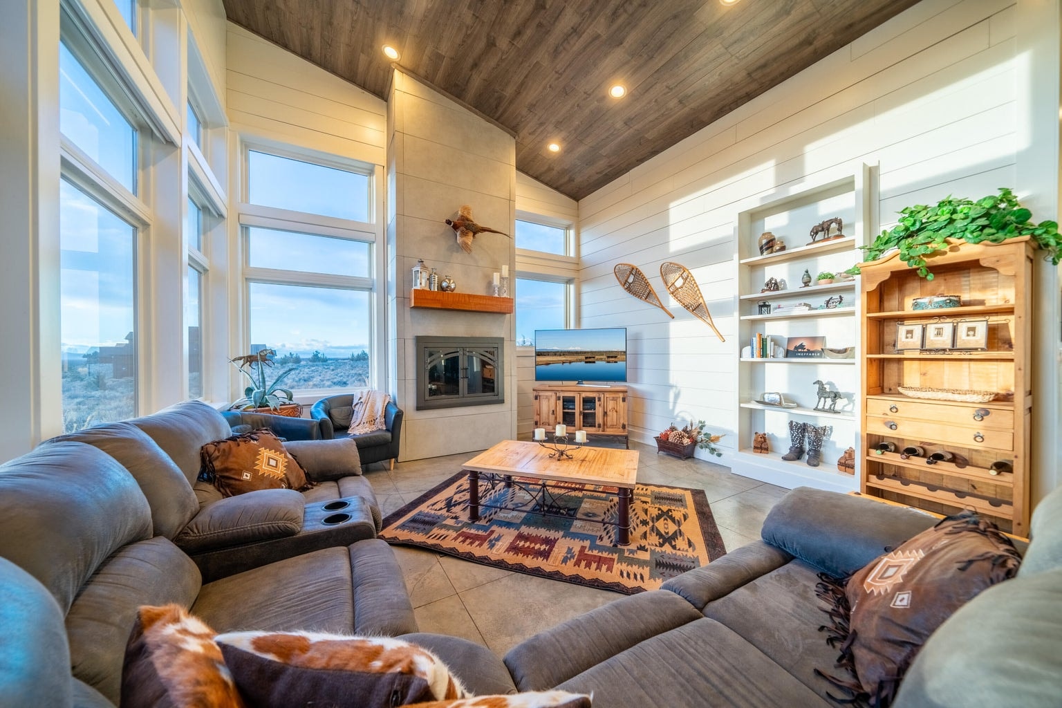 Cozy and bright during any season! Built in bookshelf!