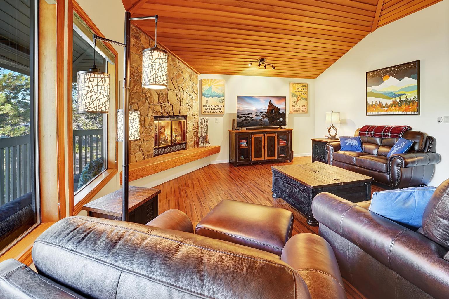 Upstairs Living Room with Fireplace & Forest Views
