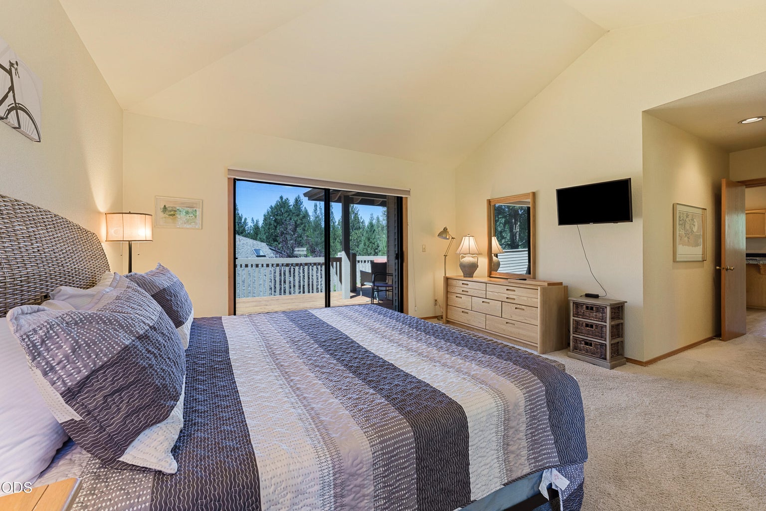 Primary bedroom suite with separate deck access