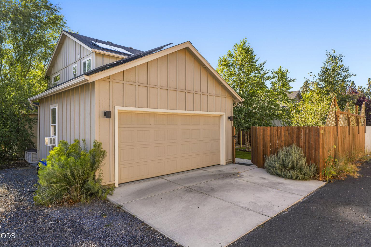 Garage with extra parking in alley.