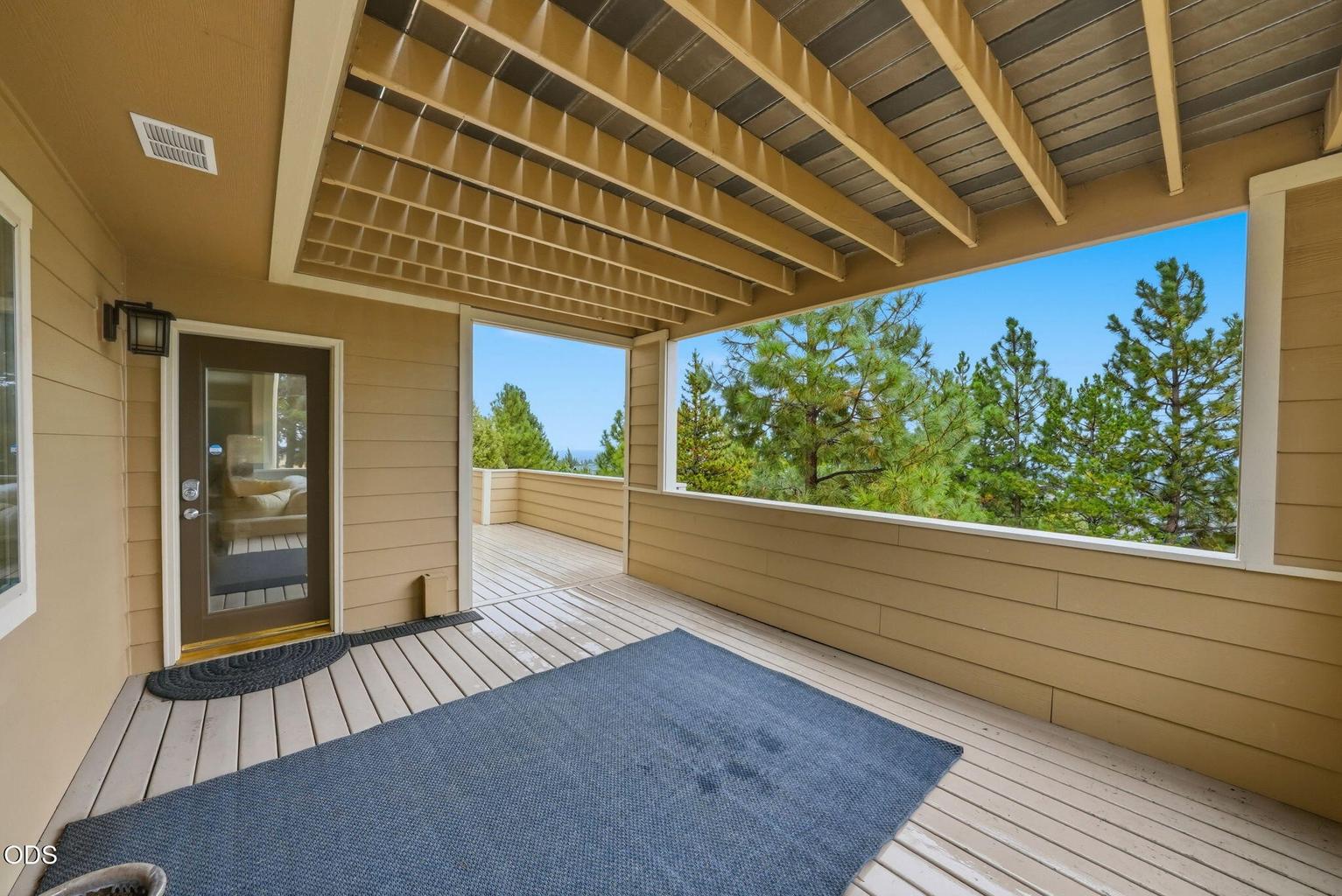 Covered Lower Level Deck with Views