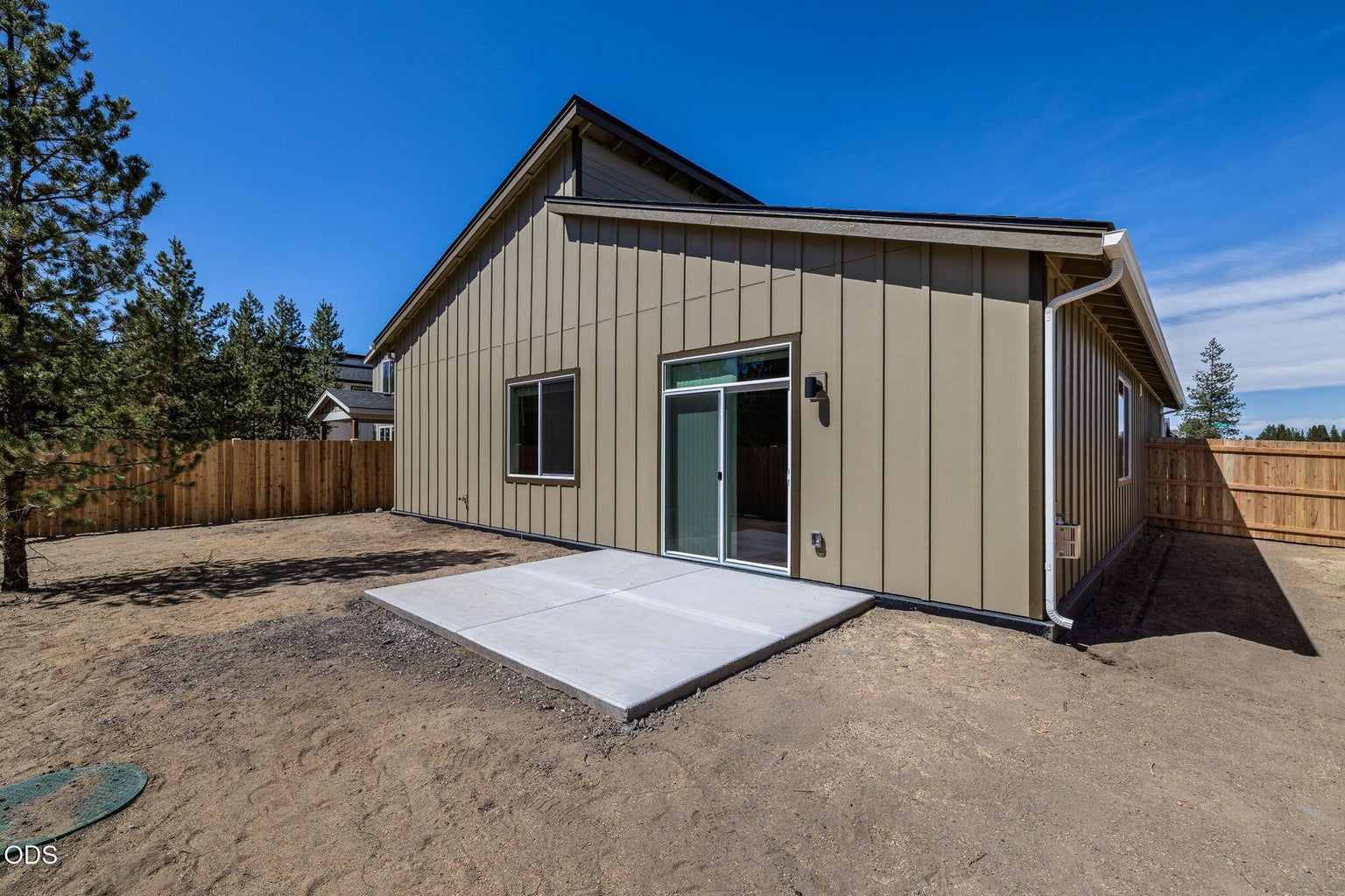 Backyard photo is of other Benson model