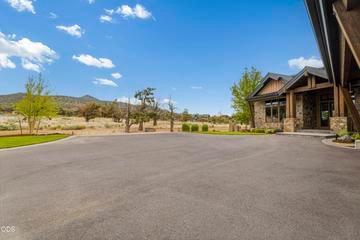 The level driveway offers peaceful views to the buttes