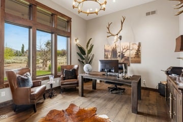 The office space is versatile, offering beautiful natural light and sunrise views