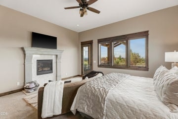 Gas fireplace in the cozy primary bedroom
