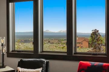 The bonus room is perfectly situated to capture the panoramic Cascade mountain range views