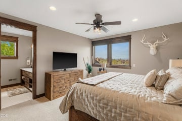 The third bedroom is upstairs with another ensuite
