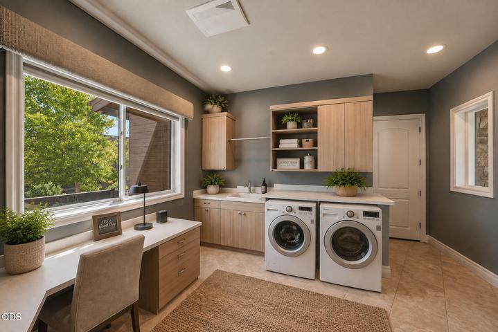 Laundry, storage room, mudroom off garage, so much!
