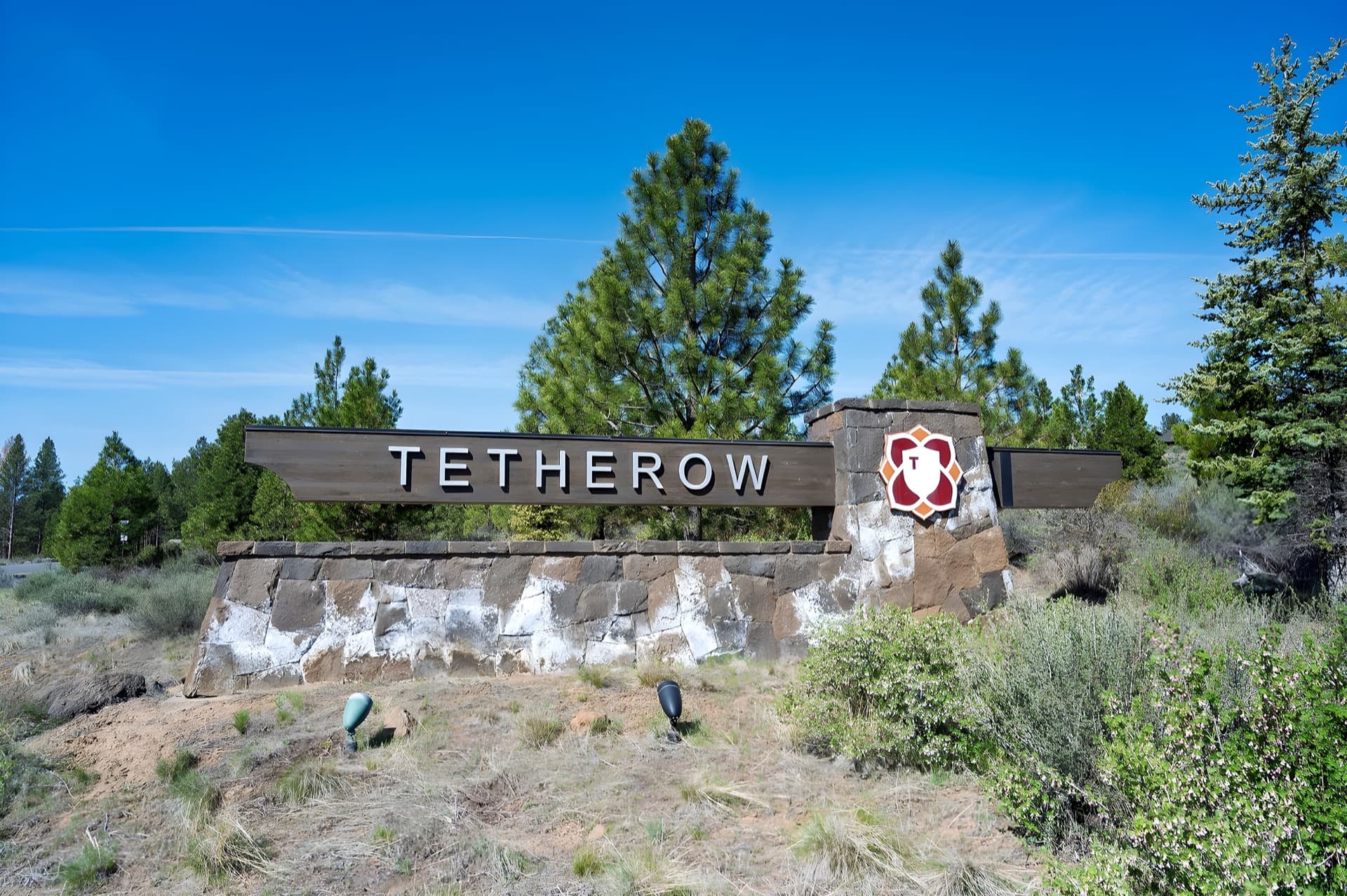Tetherow Golf Club fairway with the Cascade range behind it