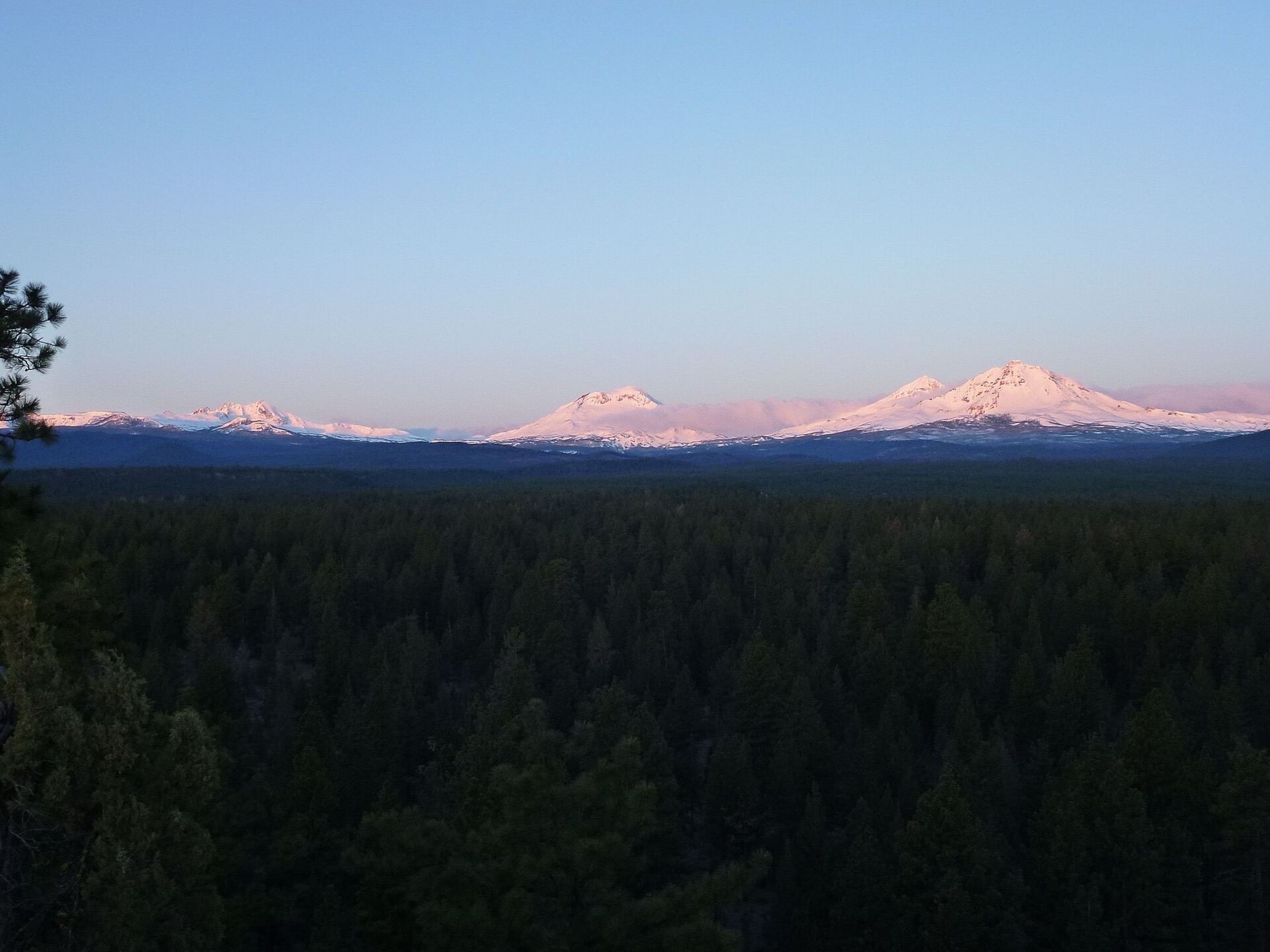 Alpenglow on the Three Sisters at sunrise